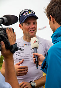 Chrigel being interviewed at the end of the 2013 Red Bull X-Alps