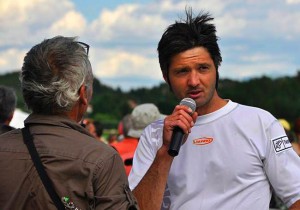 Christian Ciech is interviewed in the landing field after winning Task 3