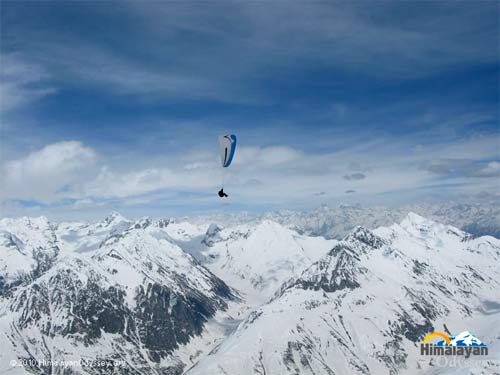 Paragliding amongst snow-capped giants. Photo: Himalayan Odyssey