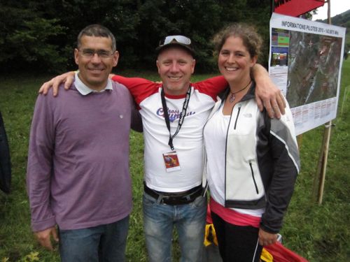 Bob Drury, centre, chats to Laura Turner, new British Paramotor Champion, and her driver and support crew, Michel Carnet Bob Drury, centre, chats to Laura Turner, new British Paramotor Champion, and her driver and support crew, Michel Carnet