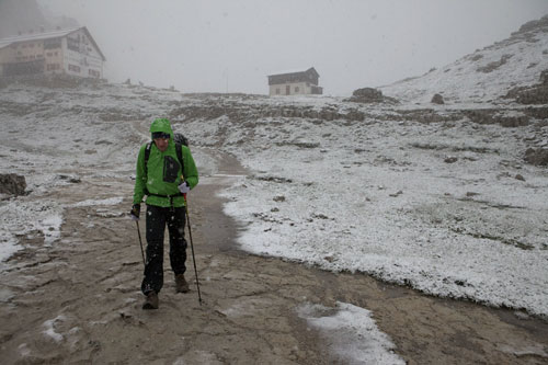 Chrigel Maurer hikes towards the Tre Cime turnpoint early in the morning on 20 July 2011. Photo: Red Bull X-Alps Chrigel Maurer hikes towards the Tre Cime turnpoint early in the morning on 20 July 2011. Photo: Red Bull X-Alps