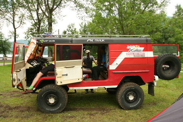 Babu Sunuwar's bus. In contrast with many of the professional-standard athletes his campaign is running on a shoestring budget. Online crowd-funding has helped him finance his race. Photo: Ed Ewing