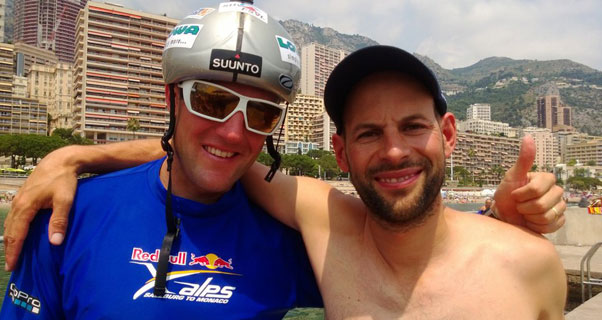 Chrigel Maurer and Thomas Theurillat on the raft in Monaco harbour after winning the Red Bull X-Alps 2013. Photo: Red Bull X-Alps / SUI1
