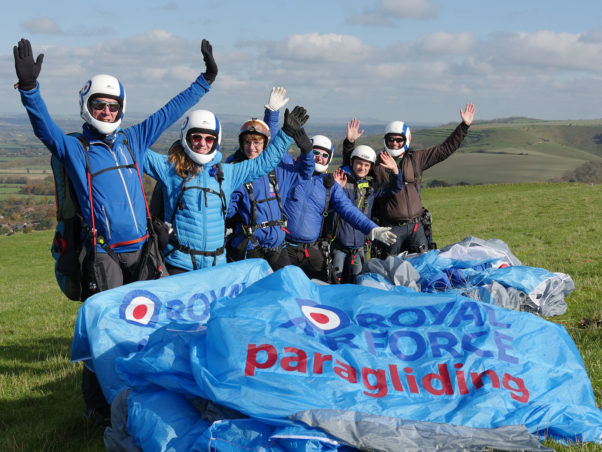 Hands up! Raf pilots and passengers with new wing and logo. Photo: Nik Valiris